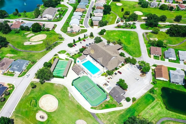 bird's eye view with a water view and a residential view