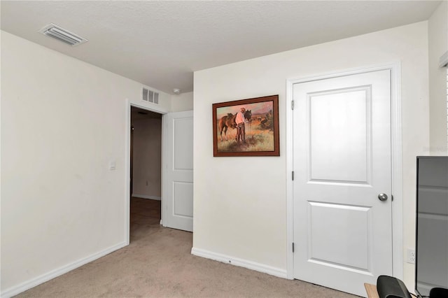 6769 SE 3rd Loop, Ocala, FL 34472 - unfurnished bedroom with light carpet and baseboards