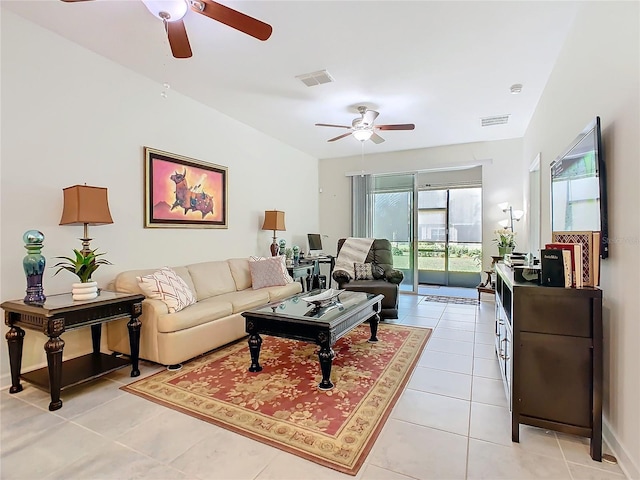 living room featuring visible vents, ceiling fan, and light tile patterned flooring