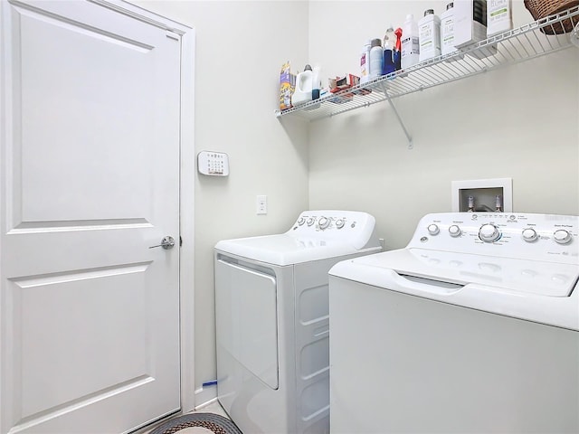 clothes washing area with laundry area and washing machine and dryer