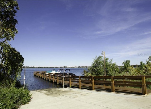 view of dock with a water view