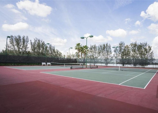 view of sport court with community basketball court and fence