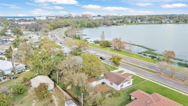 birds eye view of property with a water view