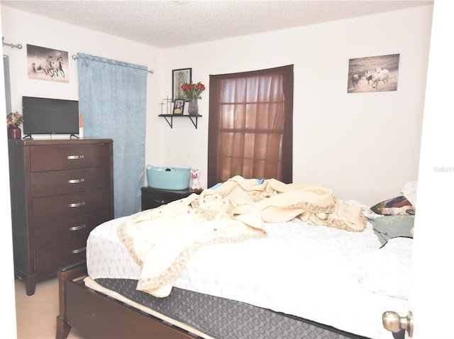 bedroom with a textured ceiling