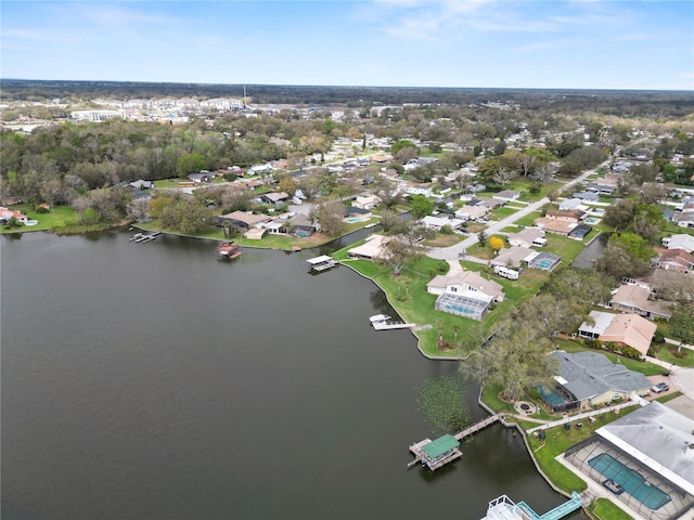 aerial view with a water view and a residential view