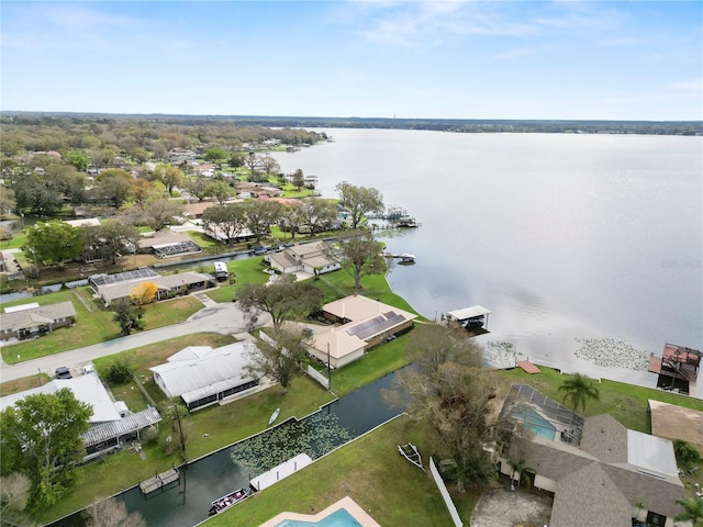 aerial view featuring a water view and a residential view