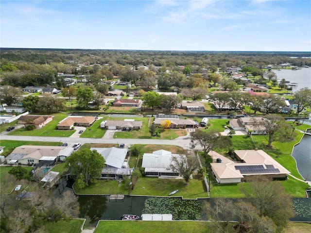 aerial view with a residential view and a water view