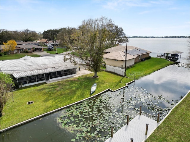 drone / aerial view with a water view