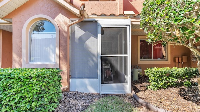 exterior details featuring stucco siding