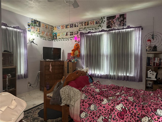 bedroom featuring ceiling fan