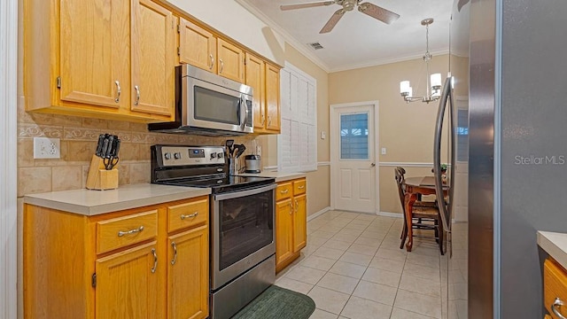 kitchen with stainless steel appliances, light countertops, ornamental molding, and visible vents