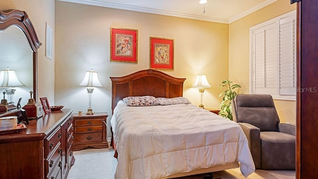 bedroom with ornamental molding and light colored carpet