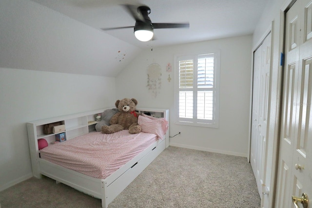 bedroom featuring lofted ceiling, light carpet, a ceiling fan, and baseboards