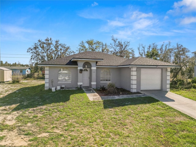 single story home featuring an attached garage, a shingled roof, driveway, stucco siding, and a front yard