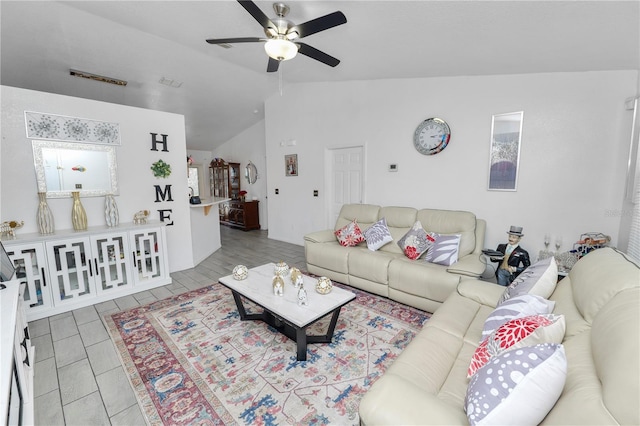 living room featuring lofted ceiling and ceiling fan