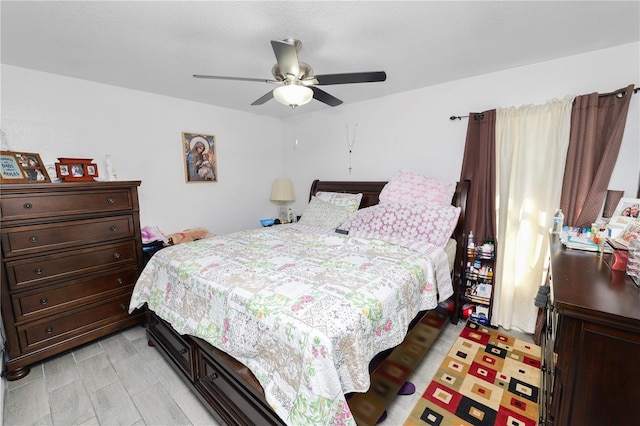 bedroom featuring ceiling fan