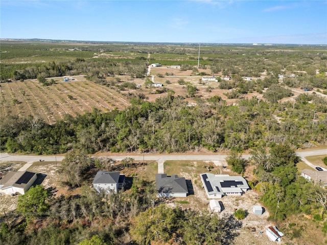 birds eye view of property featuring a rural view