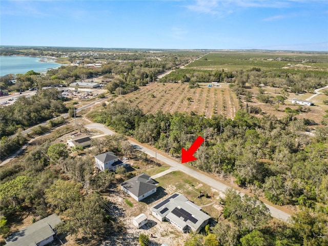 bird's eye view with a rural view and a water view