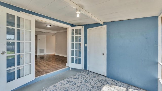 doorway to property featuring visible vents and french doors