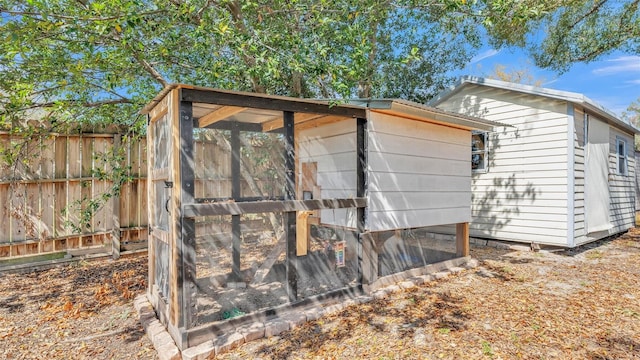 view of poultry coop with fence