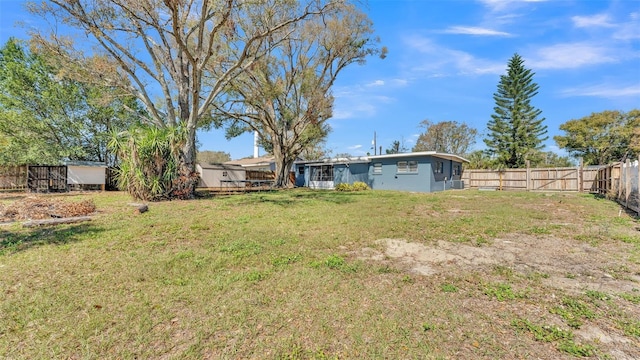 view of yard with a fenced backyard