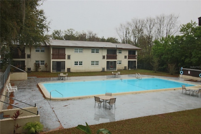 pool featuring a patio