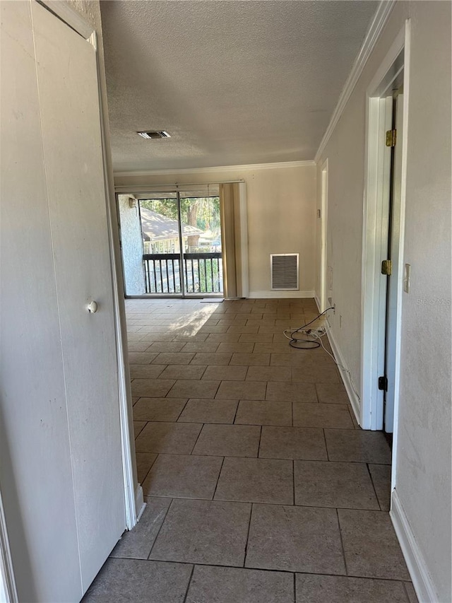141 Fernery Rd Unit B5, Lakeland, FL 33809 - interior space with visible vents, a textured ceiling, and ornamental molding
