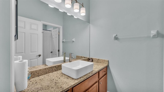 full bathroom featuring vanity