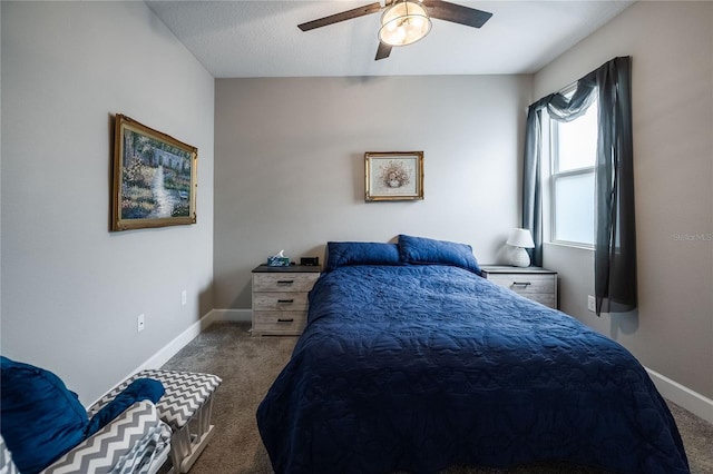 bedroom featuring carpet, baseboards, and ceiling fan