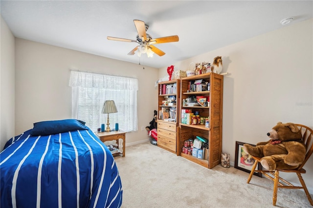 bedroom featuring a ceiling fan and carpet flooring