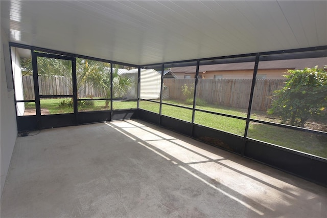 unfurnished sunroom with plenty of natural light