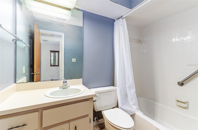 full bathroom with vanity, shower / bath combo, and toilet