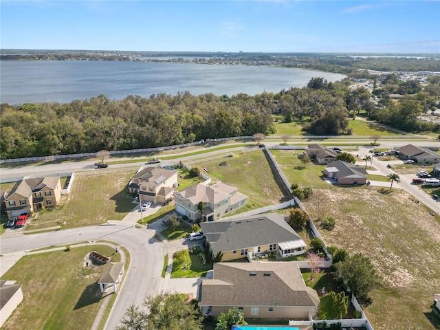 aerial view featuring a water view and a residential view