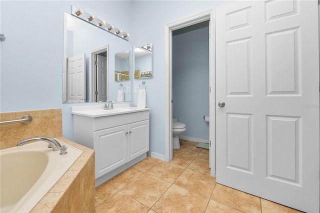 full bath featuring toilet, tile patterned flooring, a bath, and vanity