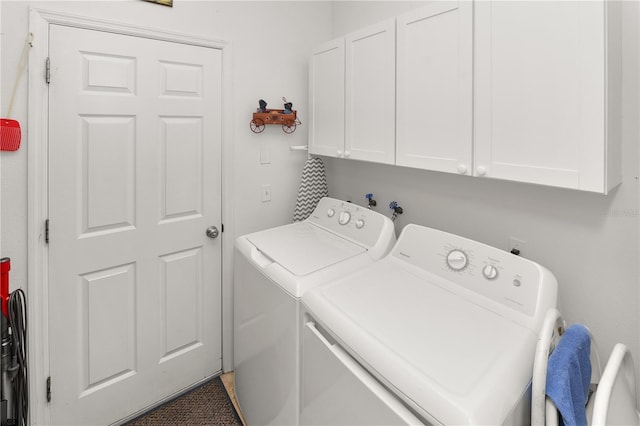 laundry area with cabinet space and washing machine and dryer