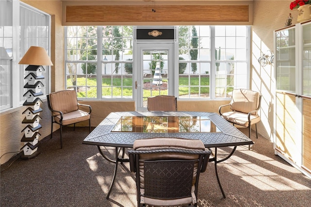 sunroom featuring a wealth of natural light