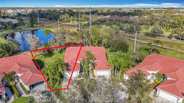 aerial view featuring a water view and a residential view