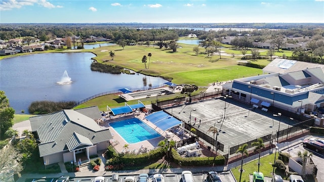 aerial view featuring a water view and golf course view