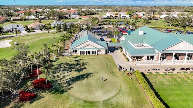 aerial view with a residential view and golf course view