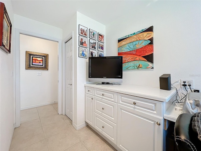 7156 Melrose Pl, Bradenton, FL 34203 - home office with light tile patterned floors and baseboards