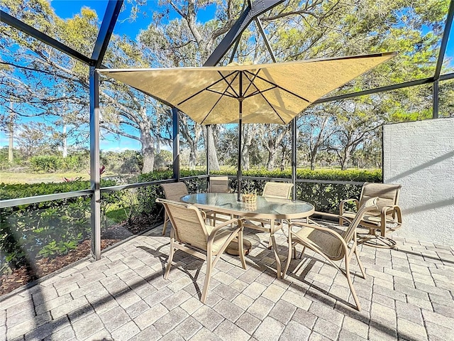 7156 Melrose Pl, Bradenton, FL 34203 - view of patio featuring outdoor dining space and a lanai