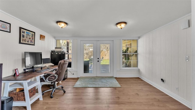 office space featuring light wood-style floors and french doors