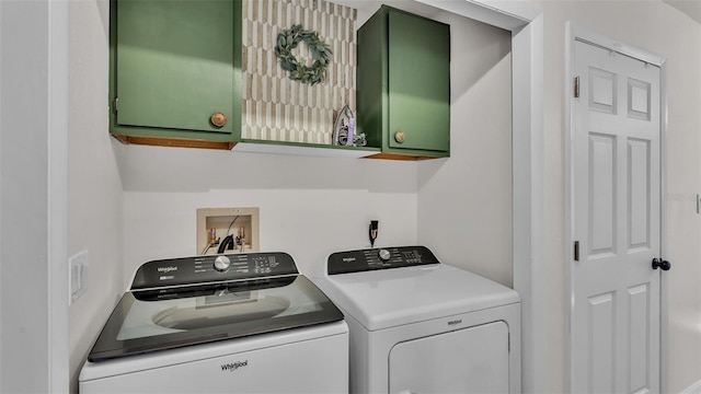 laundry area featuring cabinet space and washer and dryer