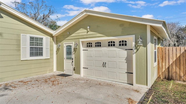 garage featuring fence