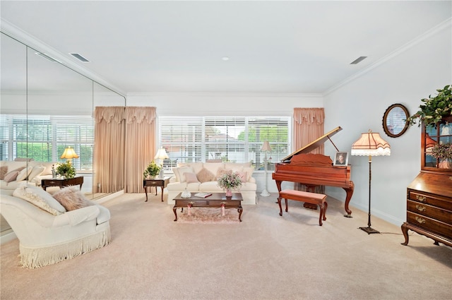 living area with ornamental molding, a wealth of natural light, visible vents, and carpet