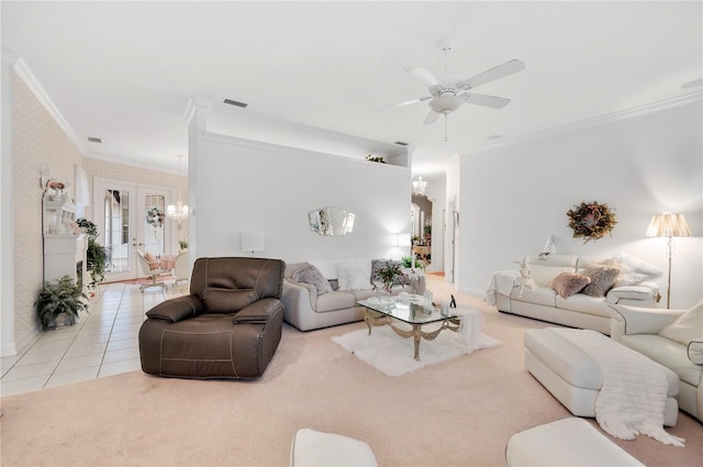 carpeted living room with wallpapered walls, visible vents, ornamental molding, tile patterned floors, and ceiling fan with notable chandelier