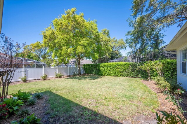 view of yard featuring a fenced backyard