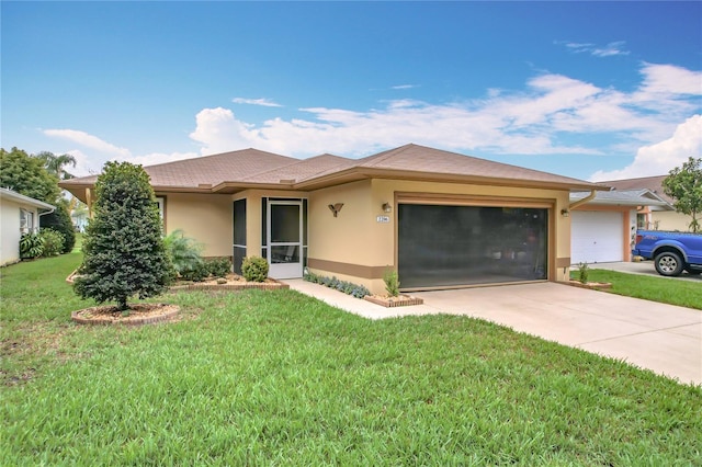 view of front of house featuring an attached garage, a front lawn, concrete driveway, and stucco siding