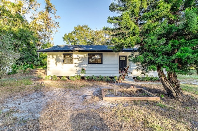 5420 Ivory Ln, Lakeland, FL 33811 - view of outdoor structure with entry steps and a garden