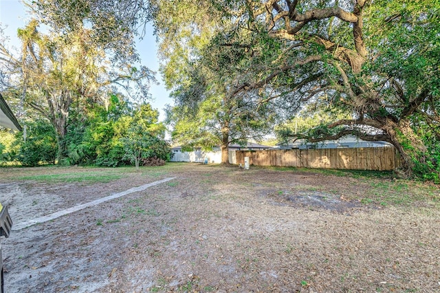 view of yard featuring fence